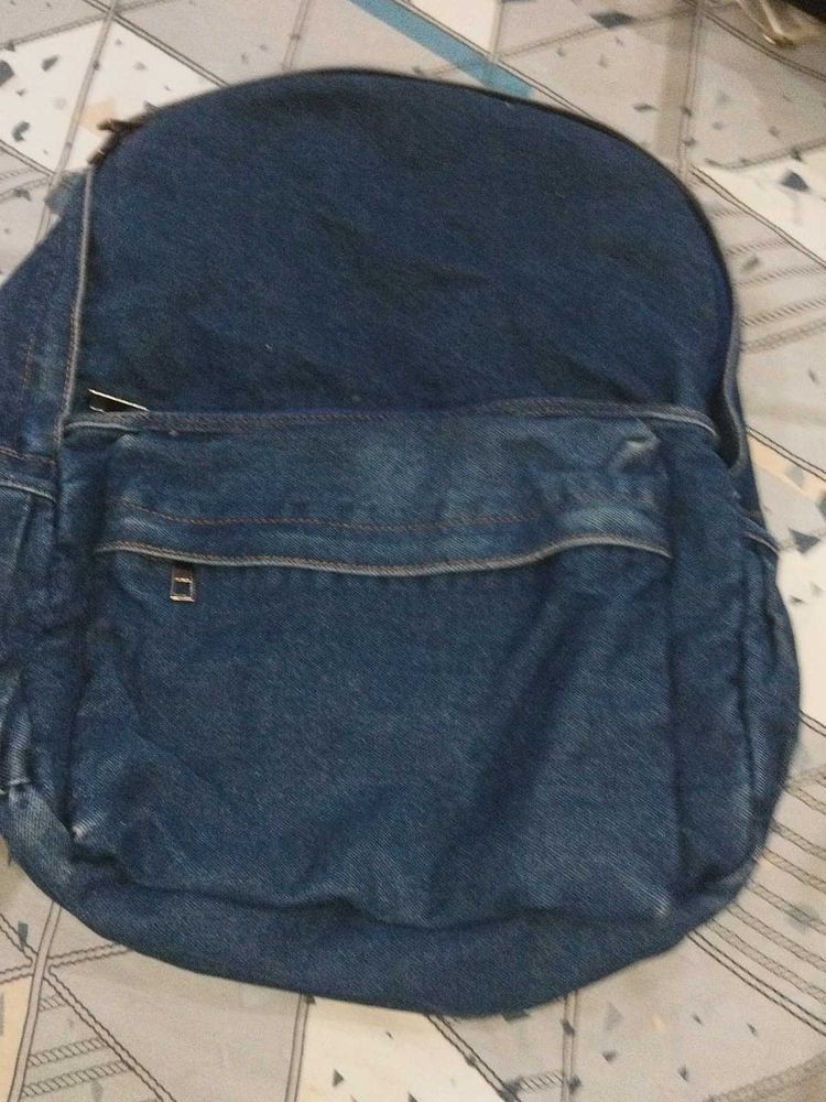 Blue Denim Backpack with Multiple Zip Compartments