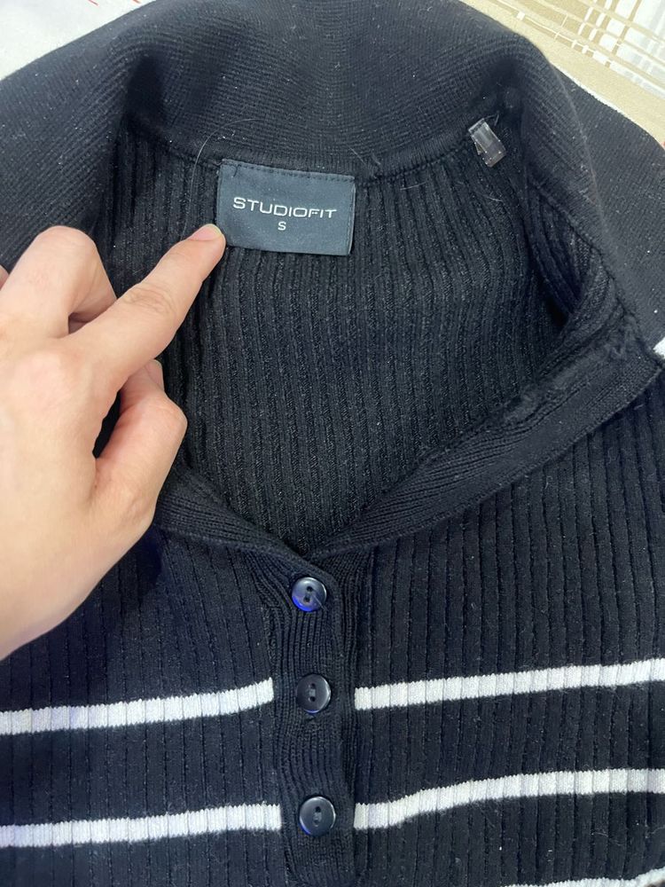 a sweater top - half sleeves - in new condition
