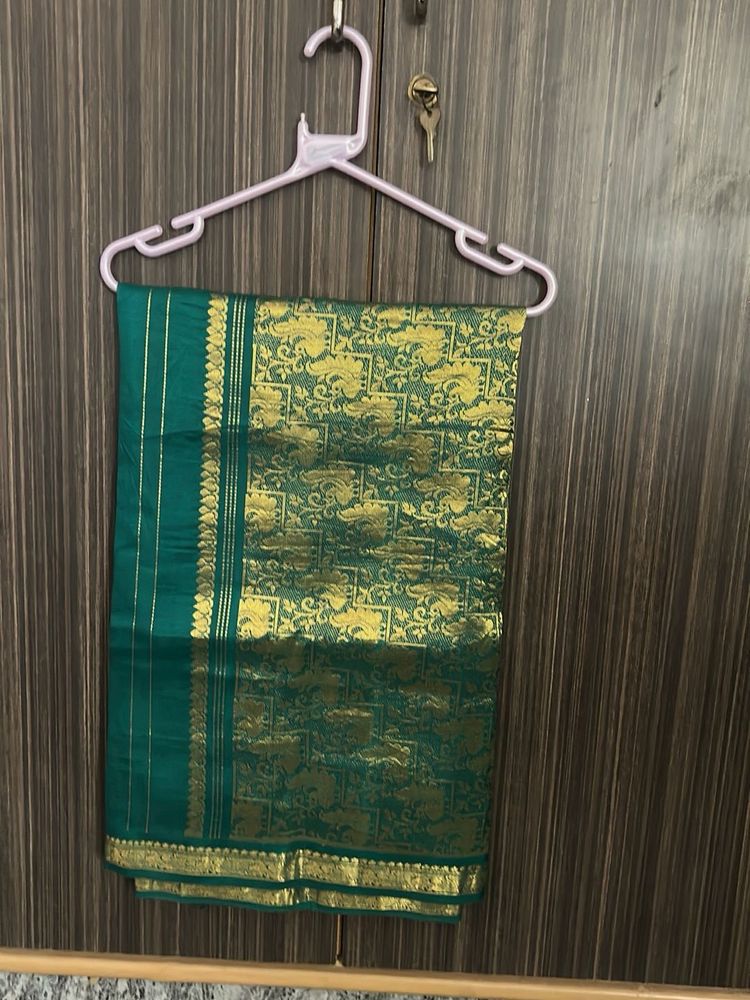 Elegant Green Silk Saree with Gold Border without