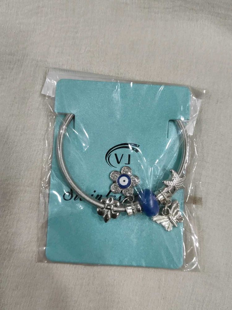 Charm Bracelet with Evil Eye and Butterfly