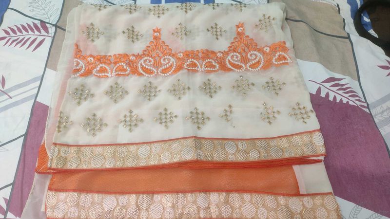Embroidered Cream &amp; Orange Saree