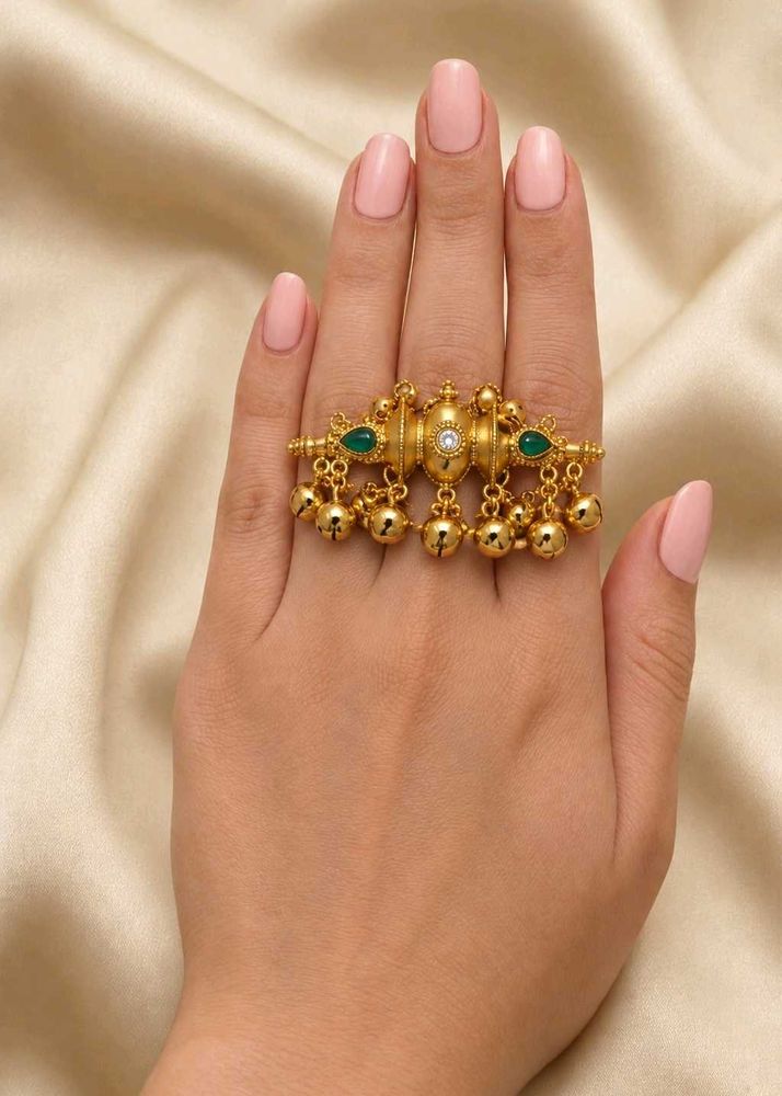 Exquisite Gold Toned Ring with Bells