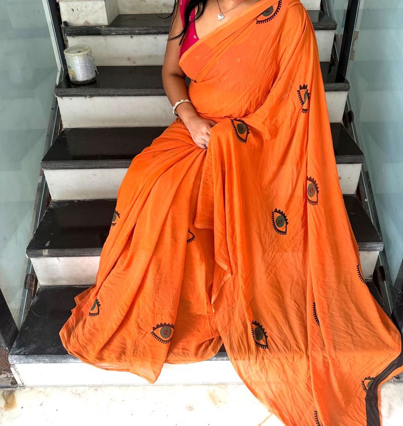 Evil eyes  Vibrant Orange Saree with Eye Print