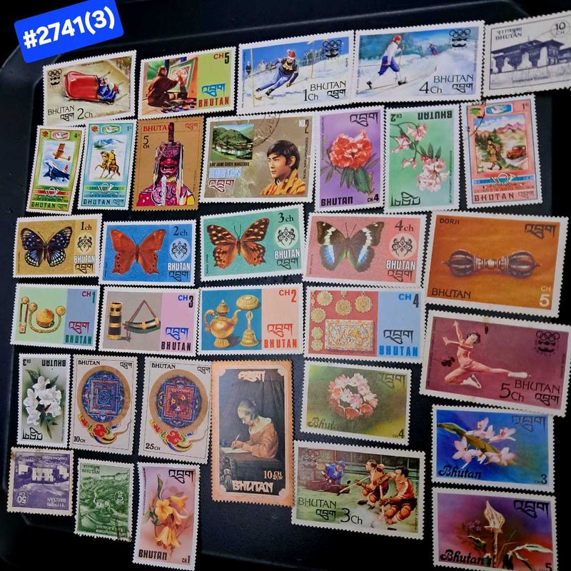 33 vintage Bhutan Stamp Collection