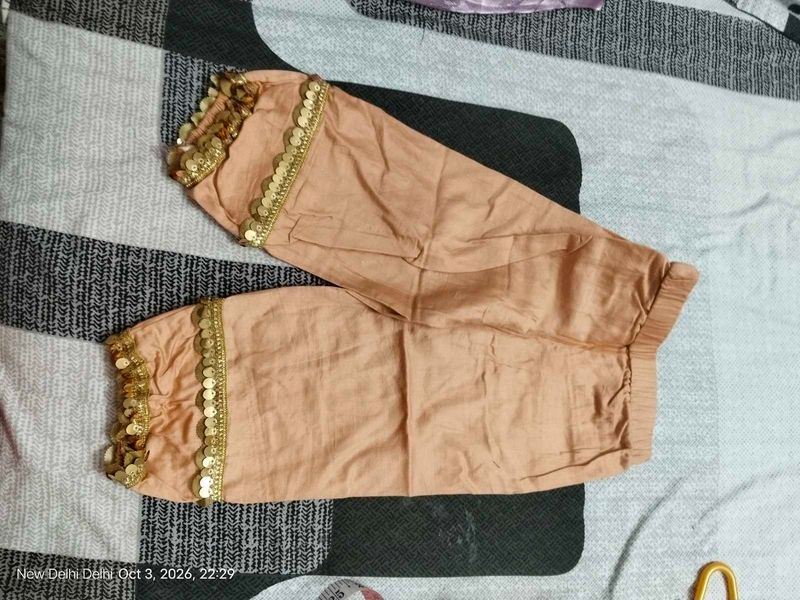 Peach Salwar Pants and frock of Sequins