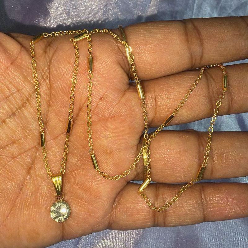 Elegant Gold Necklace with Crystal Pendant