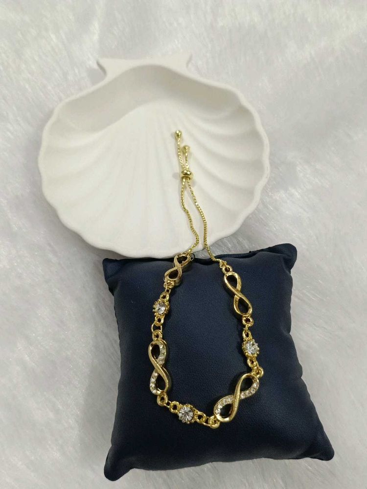 Sparkling Infinity Bracelet - Gold Tone