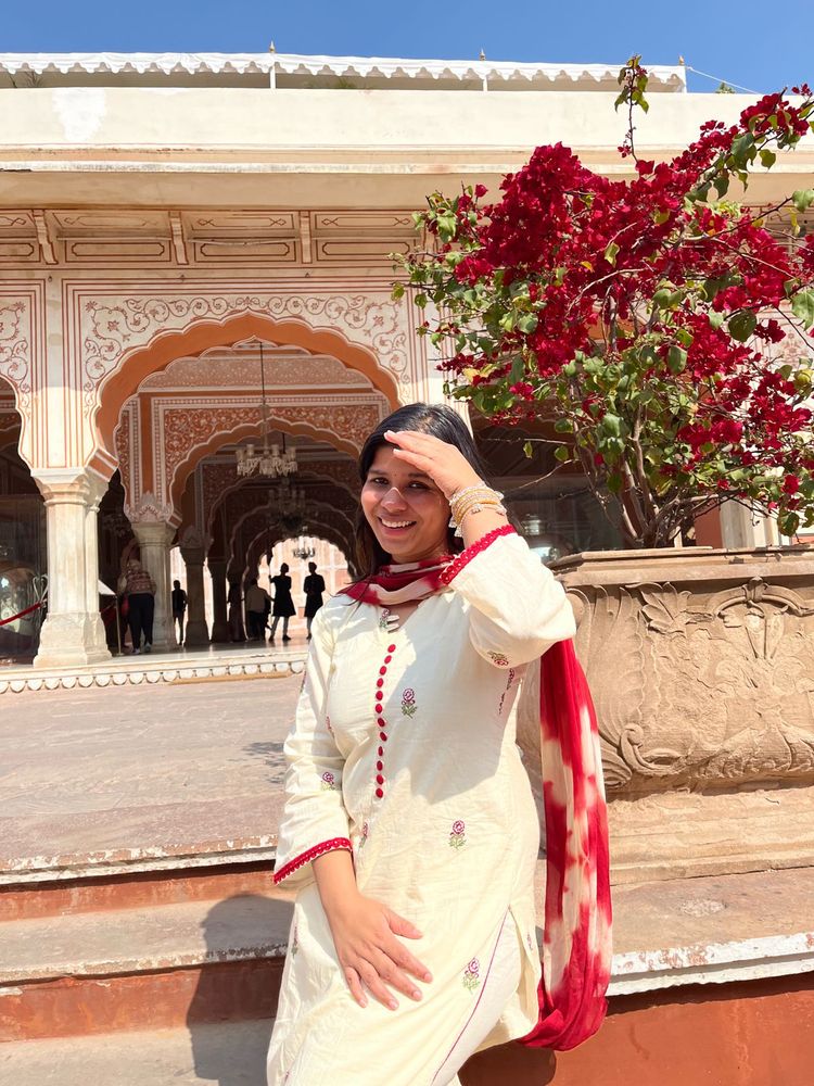 Elegant Cream Kurta with Red Accents