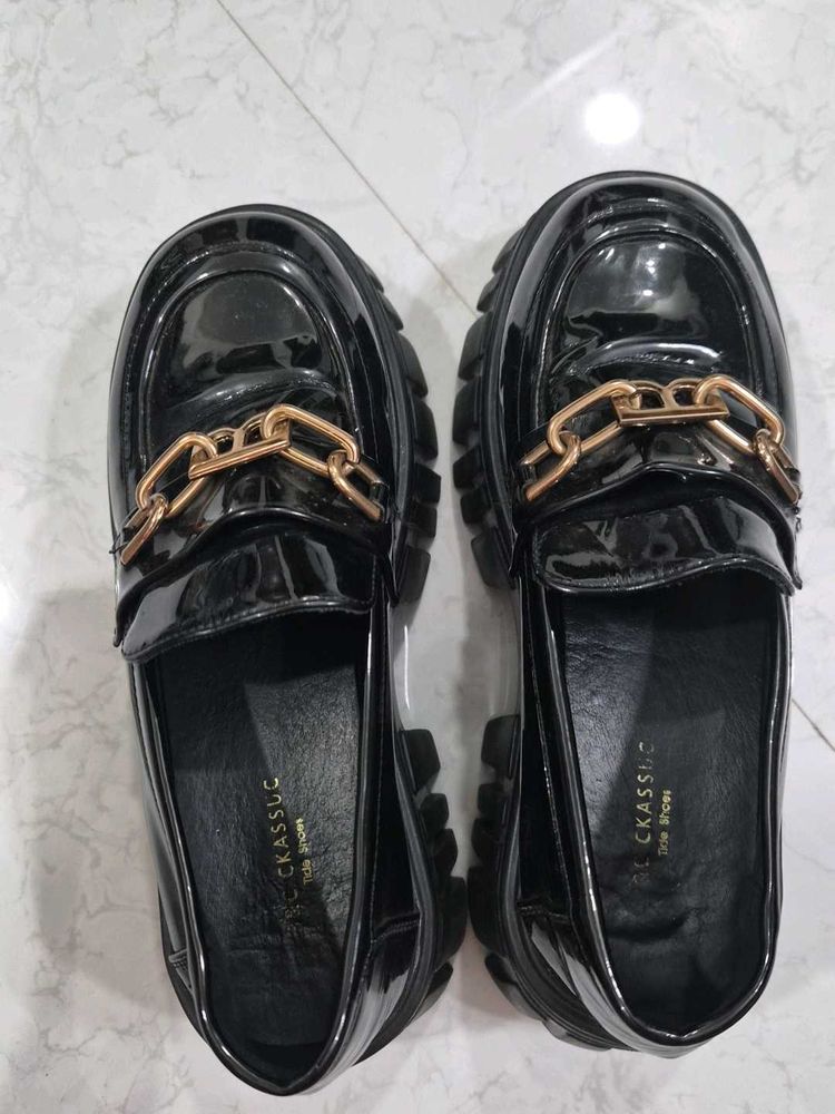 Chic Black Patent Loafers with Gold Chain Accent