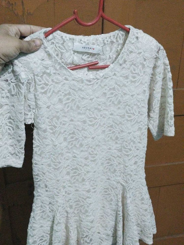 Elegant White Lace Peplum Top