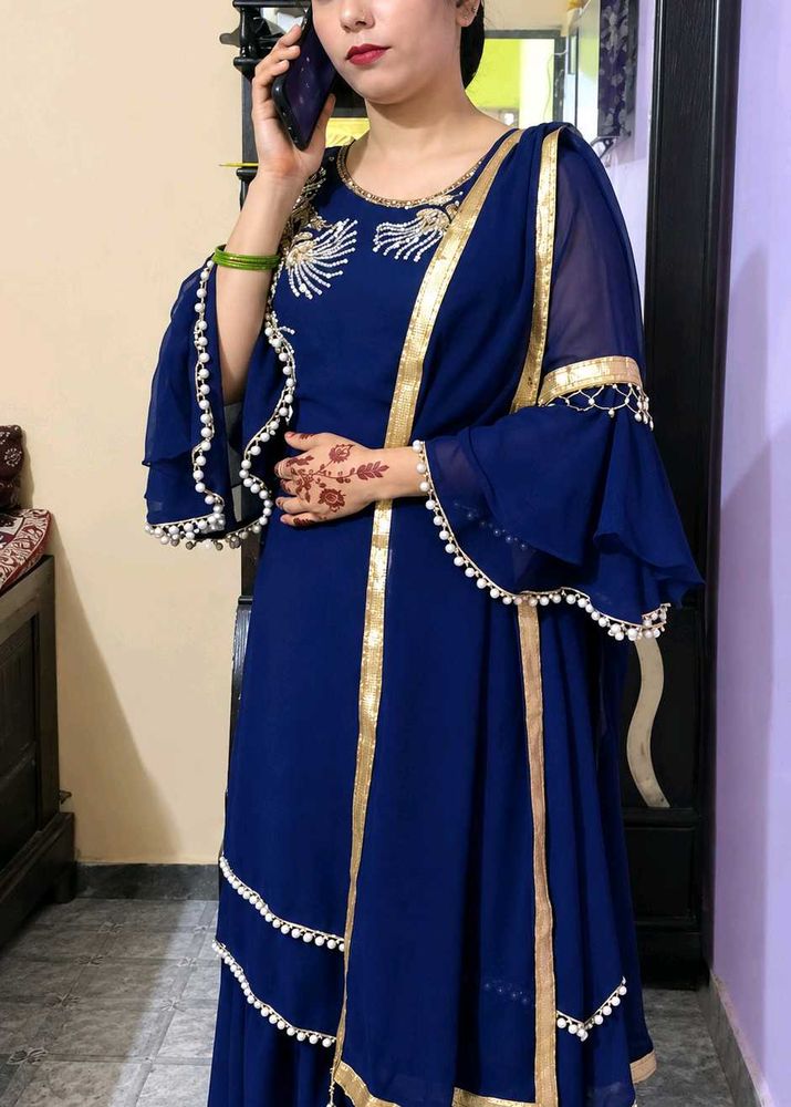Elegant Blue Kurta Set with Gold Trim