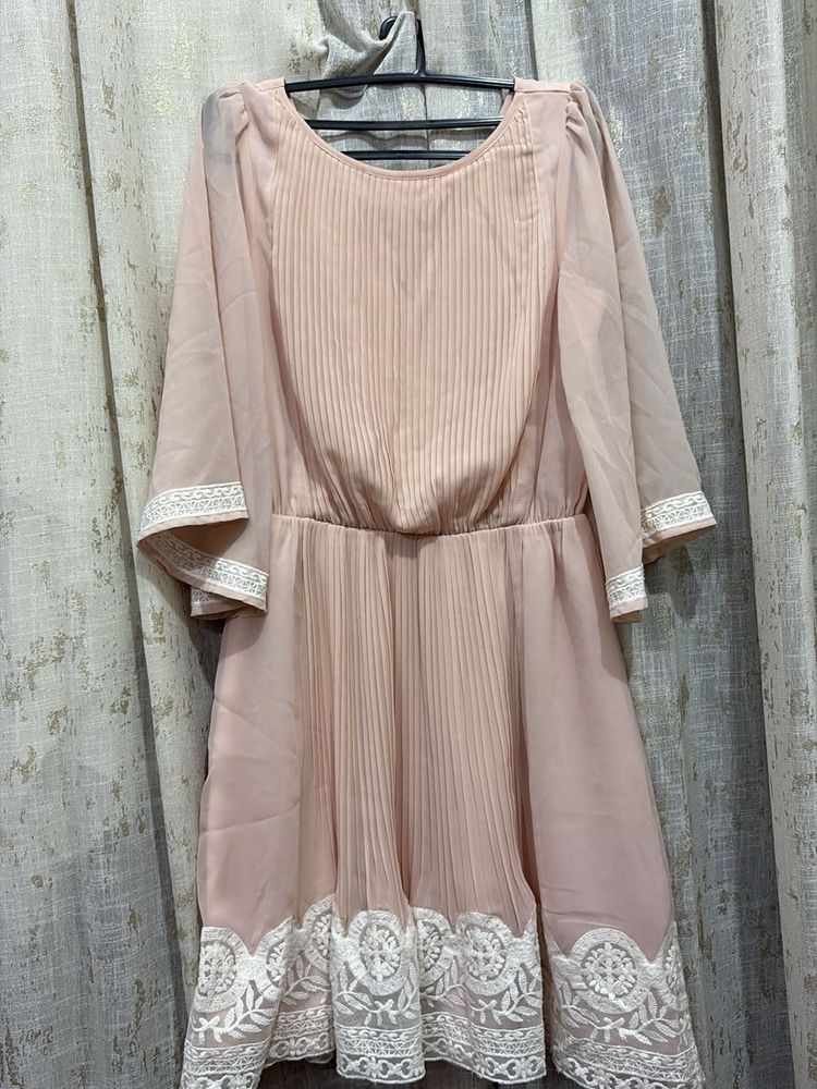 Elegant Pink Pleated Dress with Lace Trim