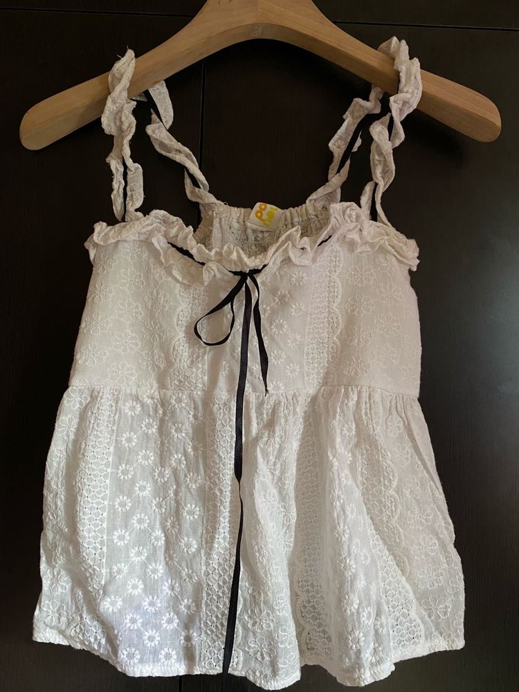 White Eyelet Ruffle Top with Black Ribbon Tie
