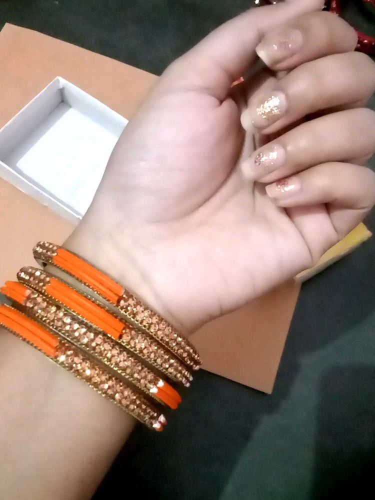 Set of Orange &amp; Silver Bangles