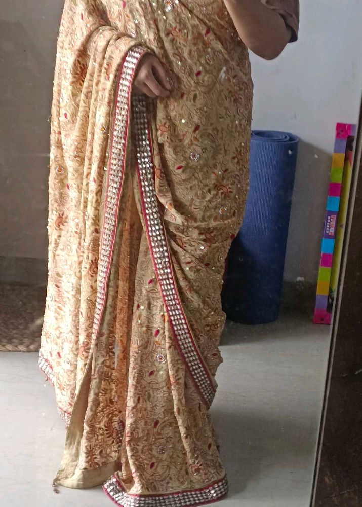 pure Georgette yellowish golden Saree
