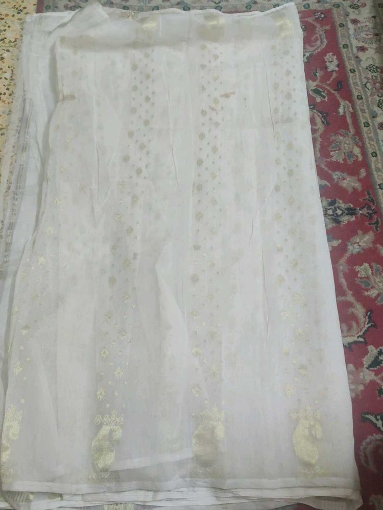 Elegant White Saree with Gold Motifs