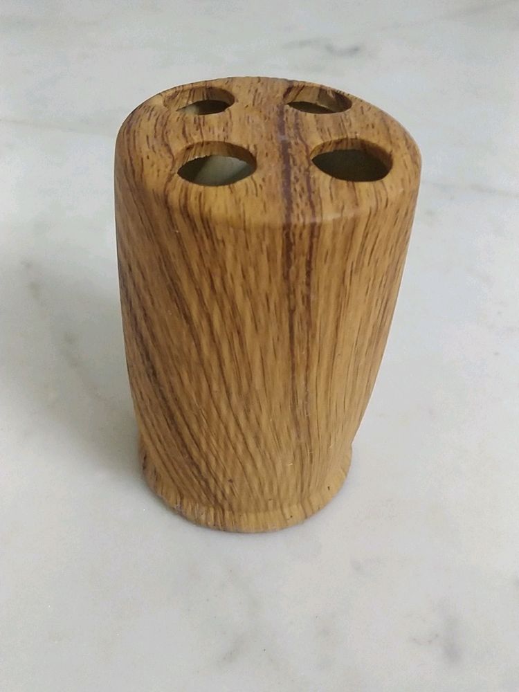 TOOTHBRUSH HOLDER