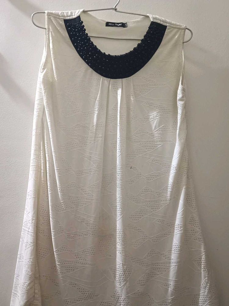 White Sleeveless Dress