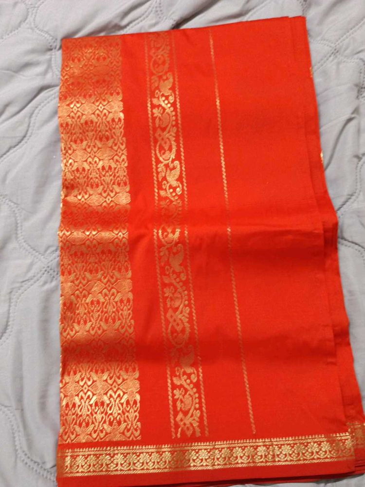 Vibrant Orange Saree with Gold Border