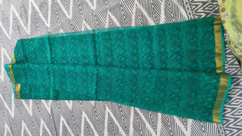 Elegant Teal  kota doria Saree with Gold Border