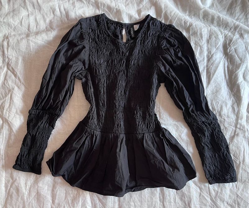 Black Smocked Puff Sleeve Peplum Top