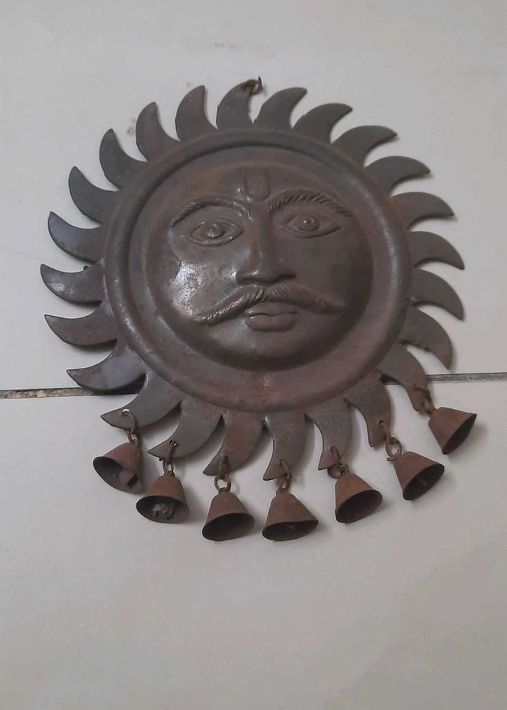 antique sun face decorative wall hanging with bell