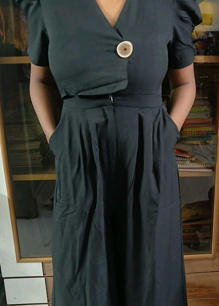 Chic Black Puff Sleeve Wrap jumpsuit.