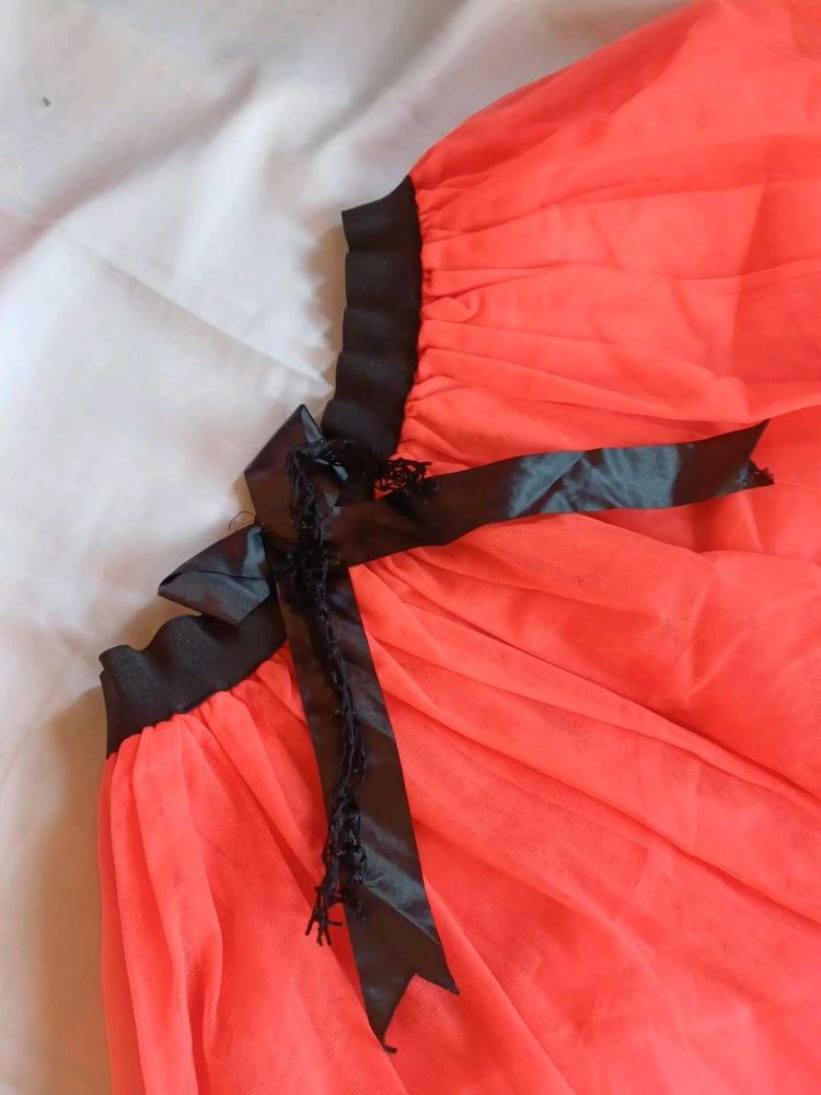 Vibrant Coral Tulle Skirt with Black Ribbon