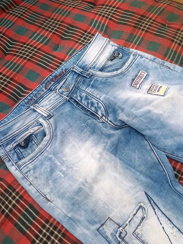 Blue Slim Fit distressed jeans