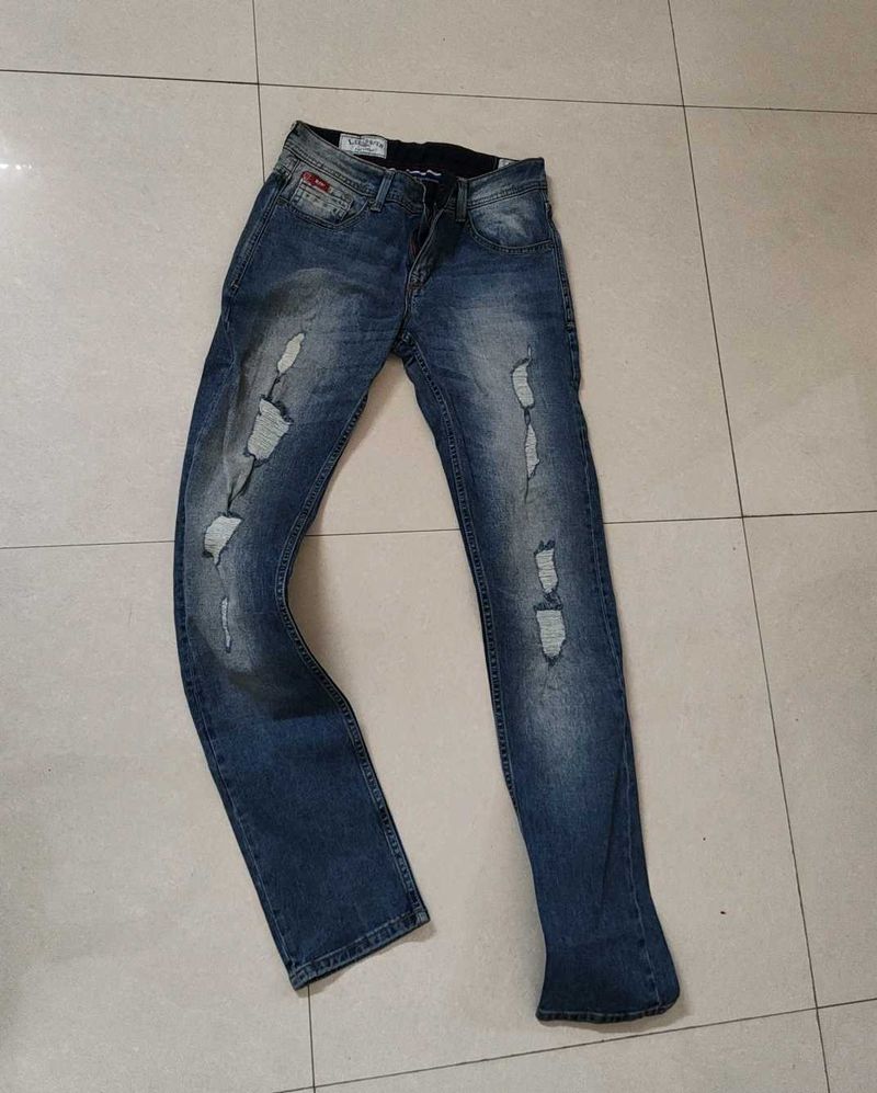 Distressed Blue Denim Jeans