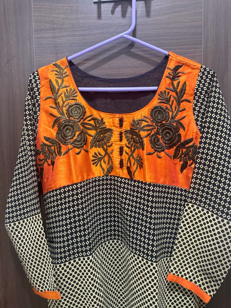 New Orange 🍊 Embroidery Kurti for ladies