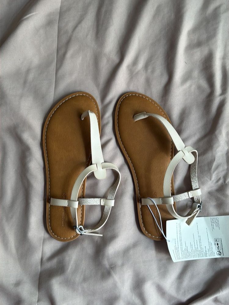 Cream T-Strap Flat Sandals