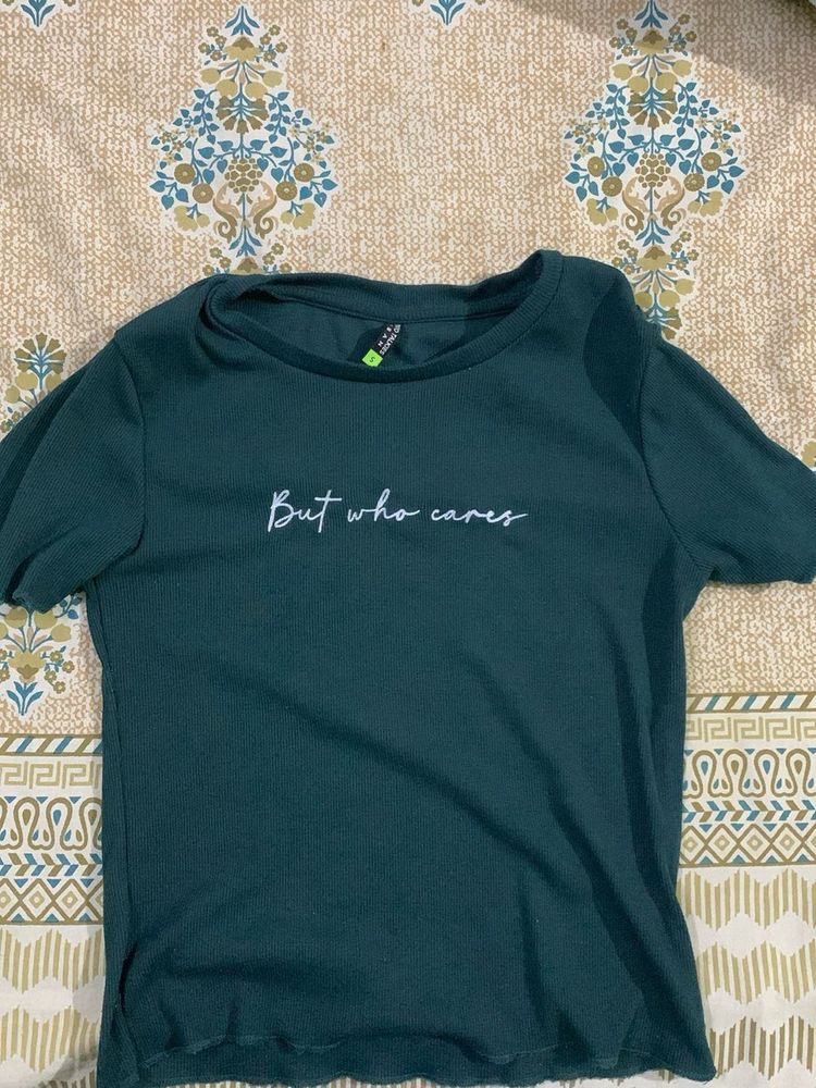 Green "But Who Cares" T-Shirt