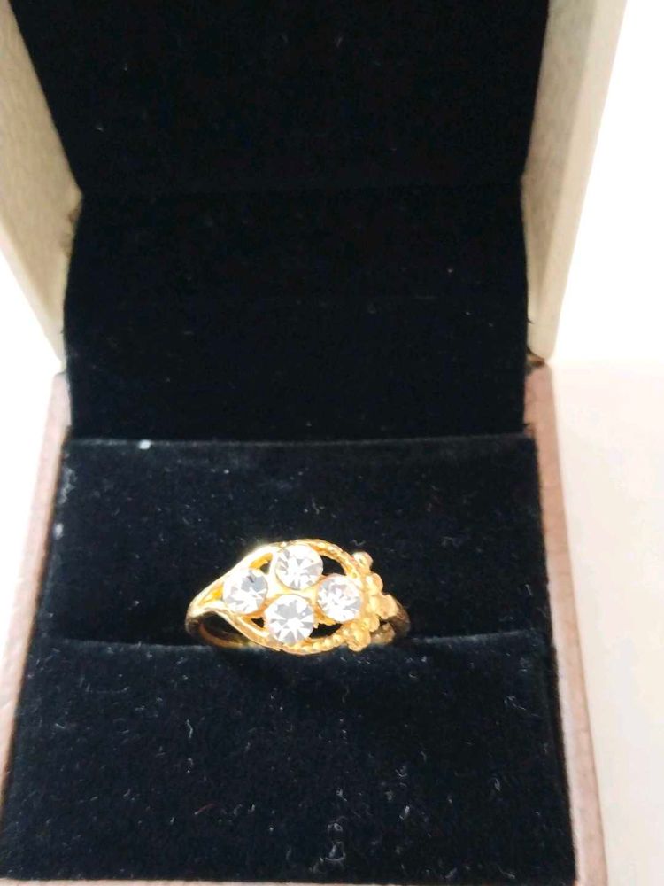 Elegant Gold Ring with Clear Stones
