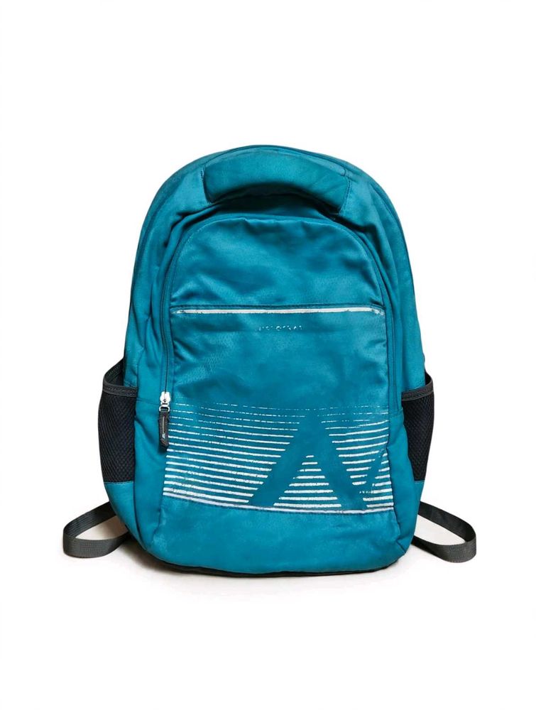 Teal Backpack with Geometric Design