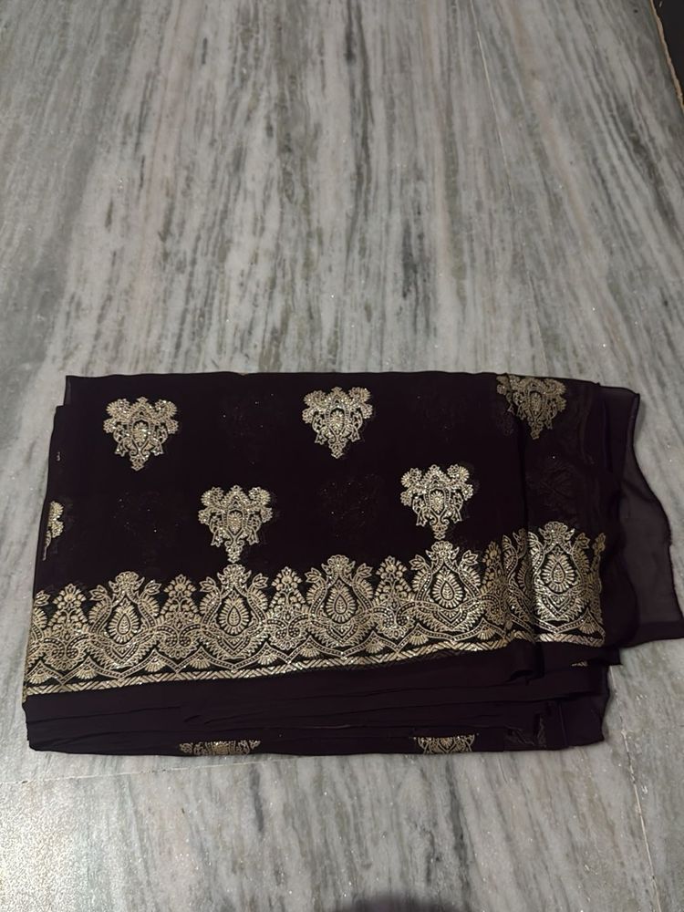 brown shiny saree