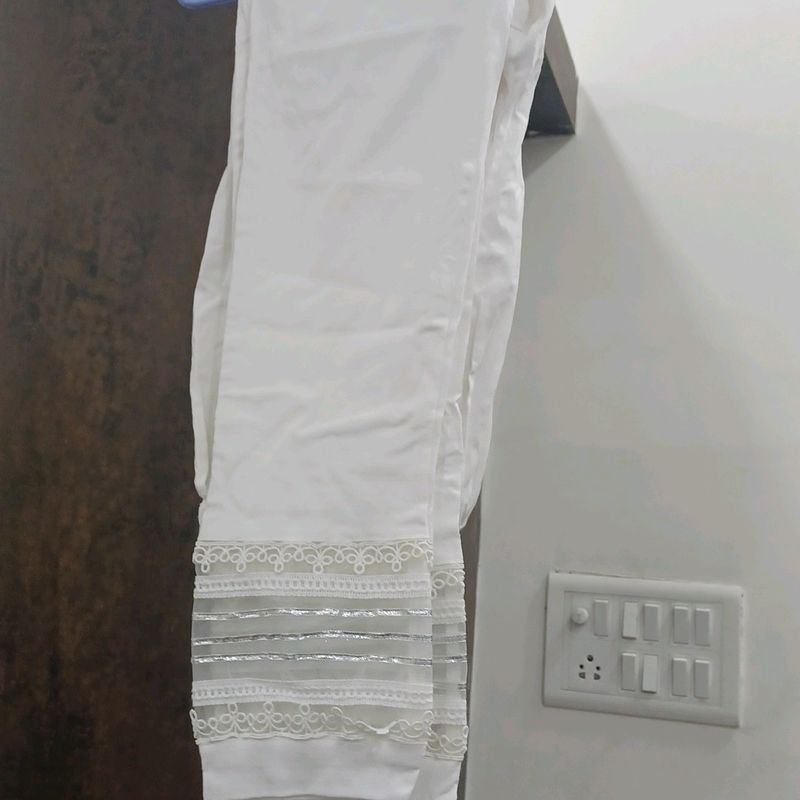 white stretchable pant for suits. size is small and the fabric is stretchable.