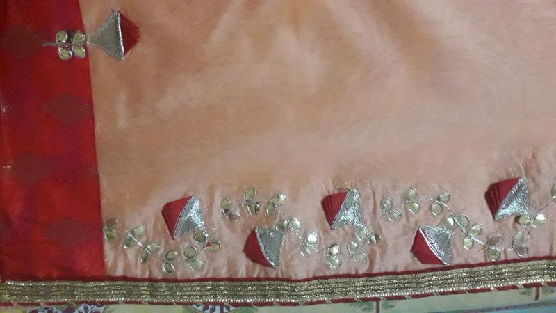 Elegant Peach Saree with Red Border