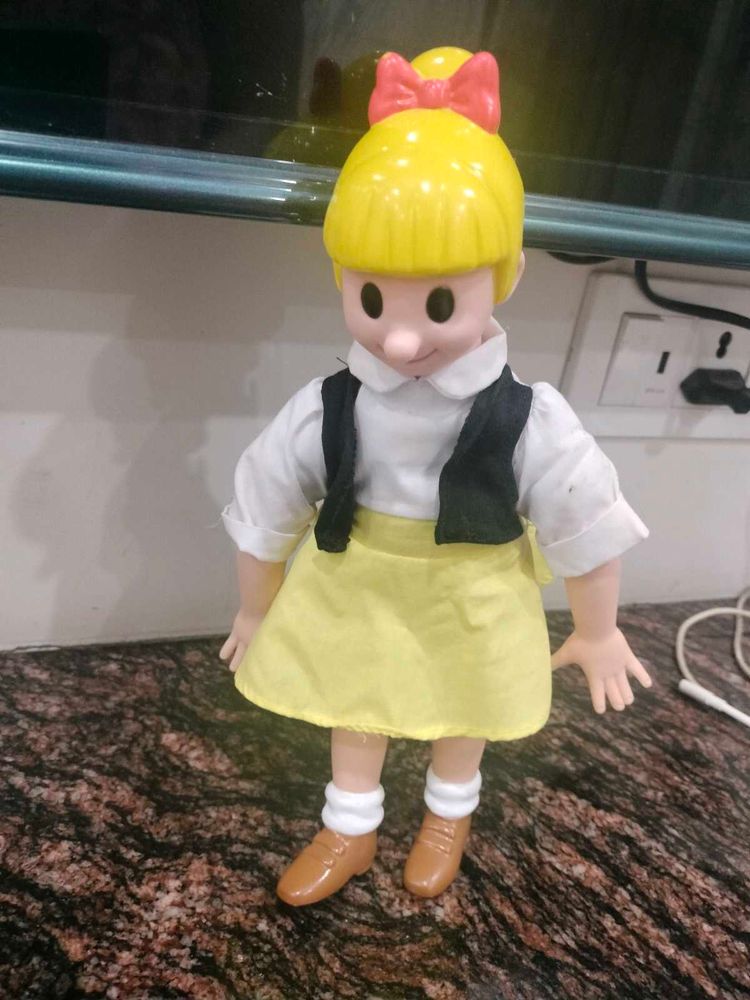 Vintage Blonde Doll with Bow