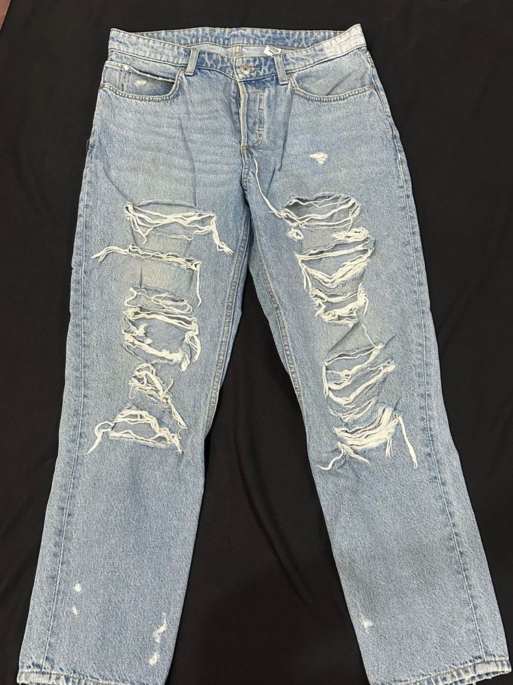 Distressed Blue Denim Jeans