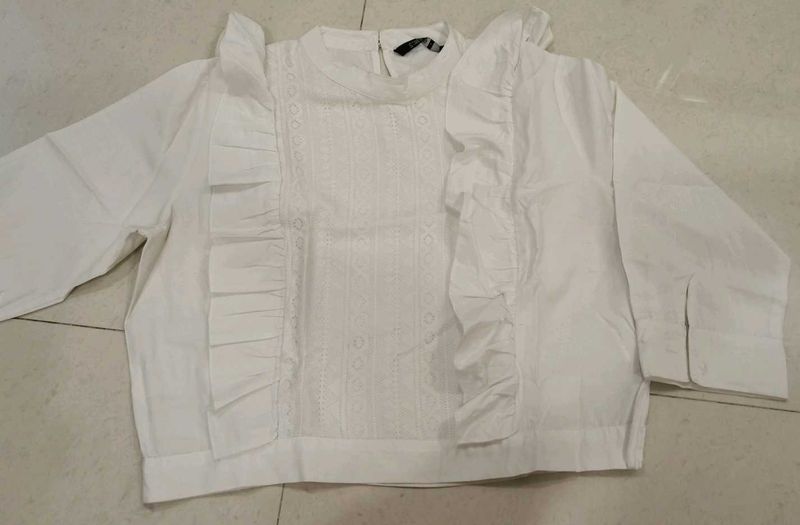 White Ruffled Blouse