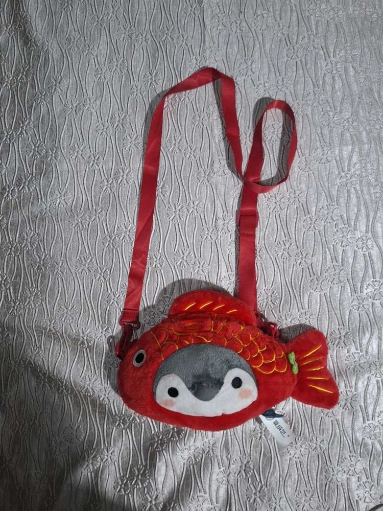 fish bag with penguin.