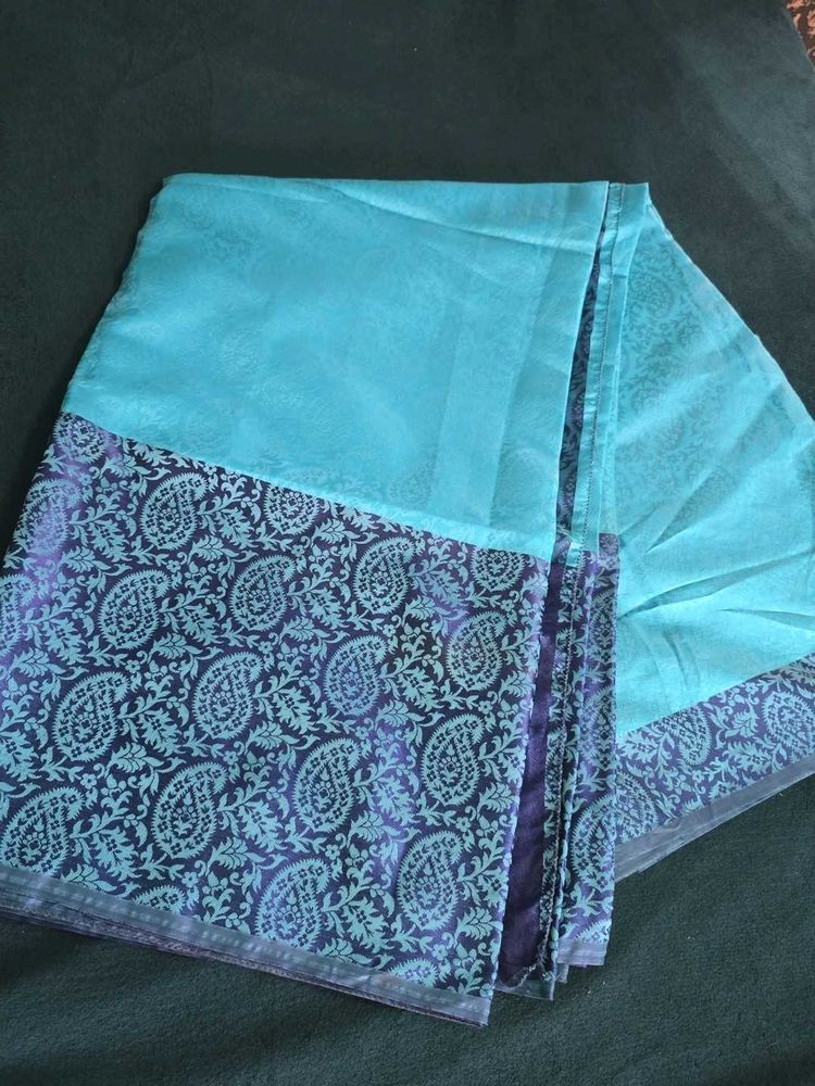 Beautiful Teal Saree with Paisley Border