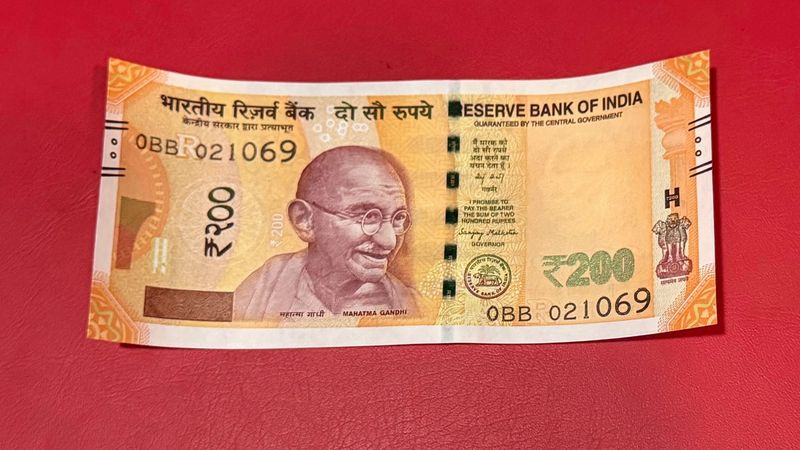 200 rs with Gandhi ji birthdate serial number