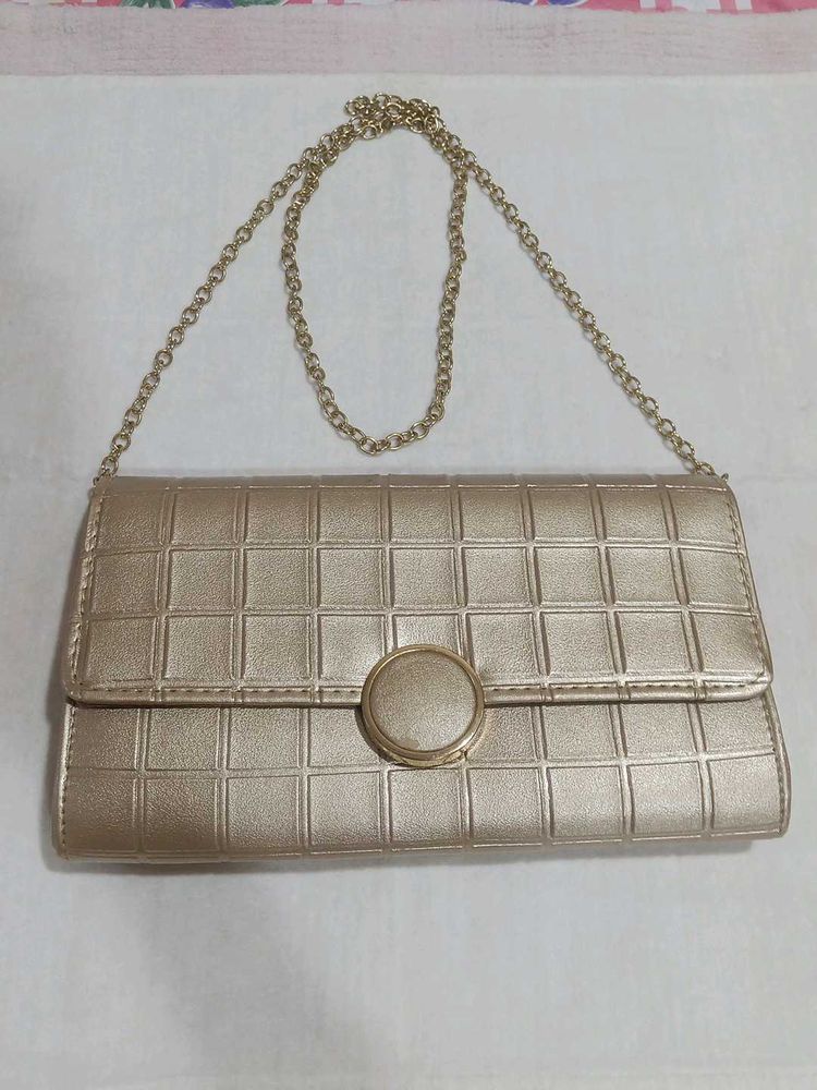 Mochi Gold Textured Clutch Bag
