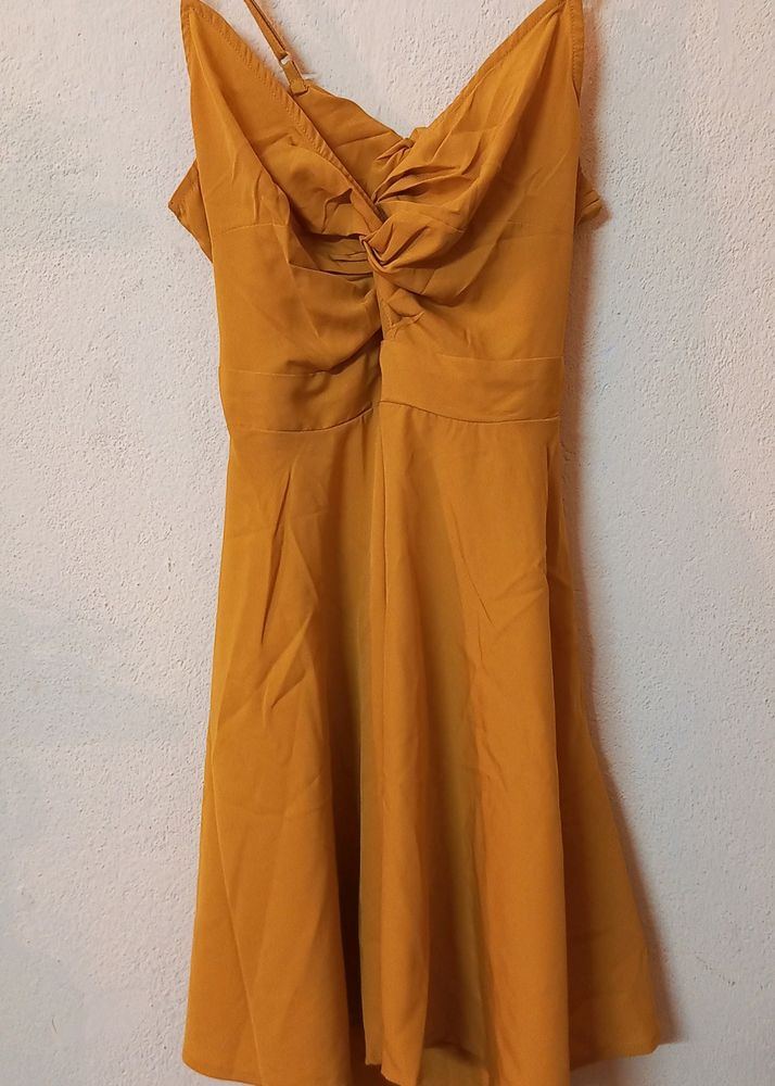 Today's Offer ₹150 Berrylush Women Solid Yellow Front Twist Knot Fit &amp; Flare Mini Dress For Women (Mustard Colour)
