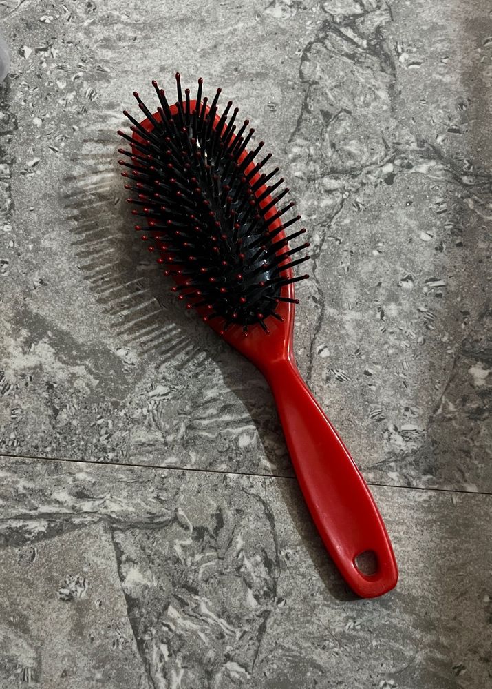 Red Oval Hair Brush