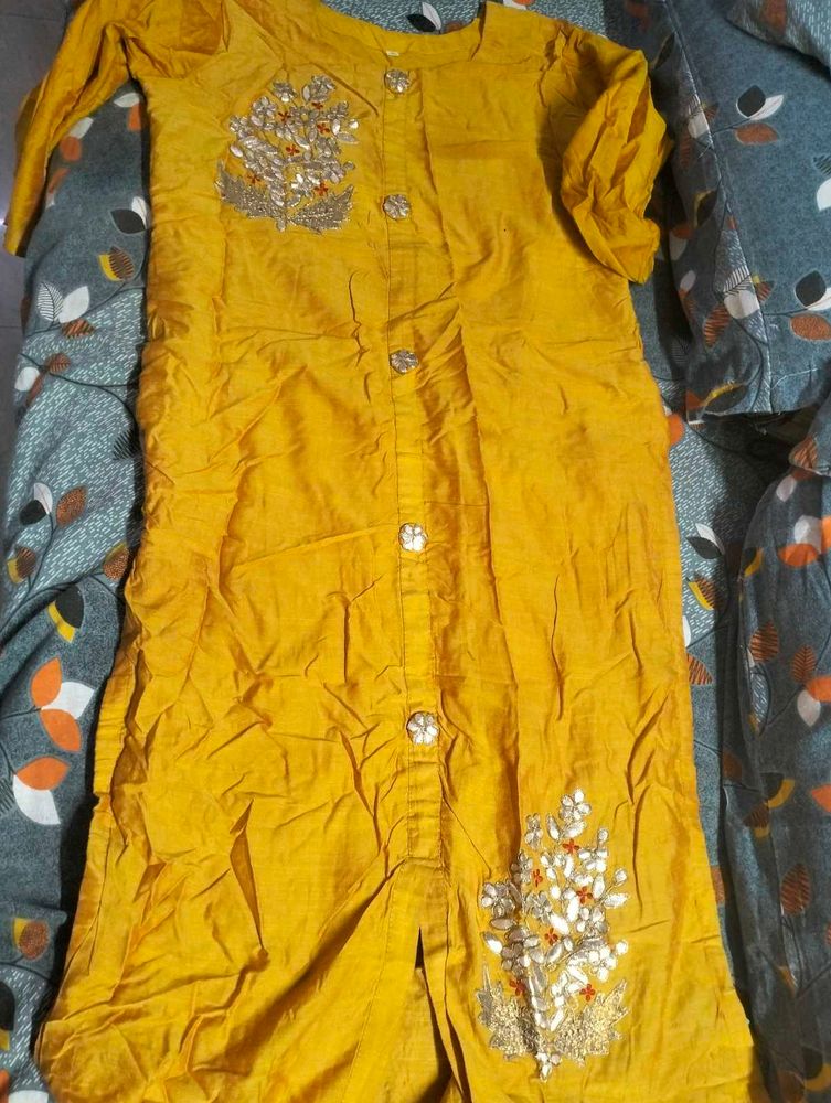 Elegant Yellow Kurta with red skirt