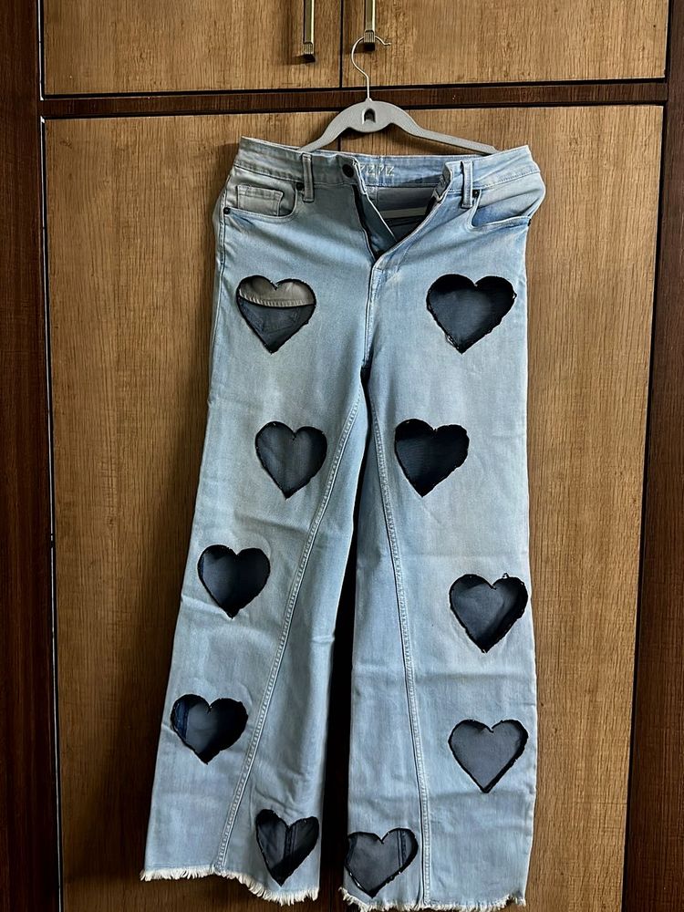 Unique Heart Cutout Flare Jeans