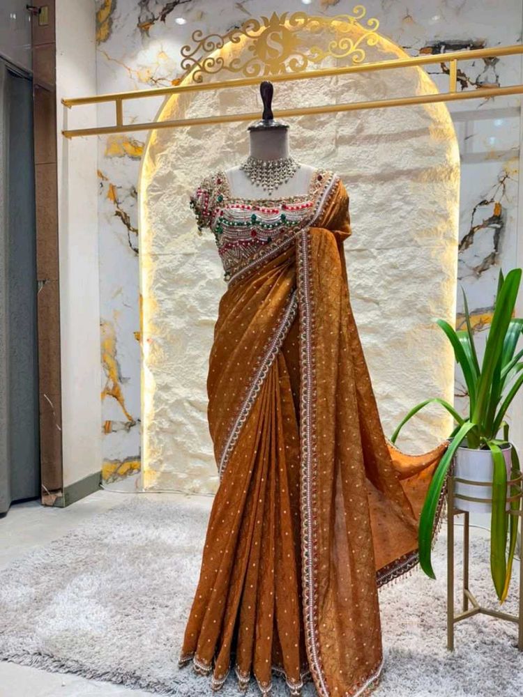 Elegant Brown Embellished Saree